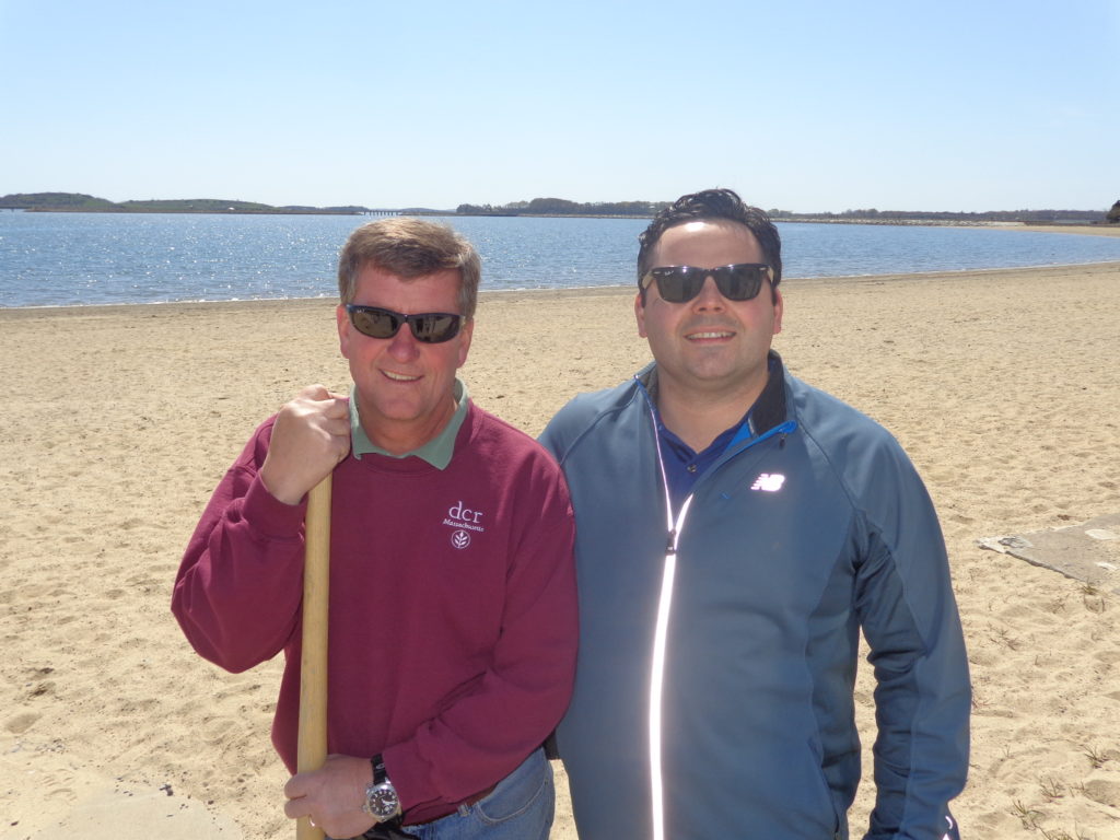 Chris Spillane (left) is pictured at the South Boston Lagoon cleanup with Rep. Nick Collins. (Photo by Kevin Devlin)